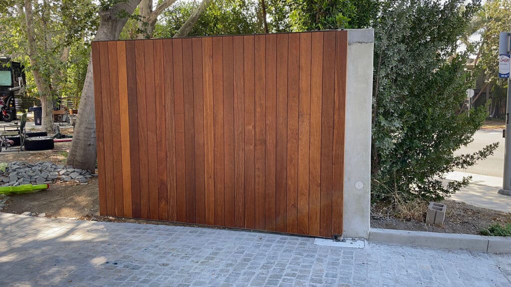 vertical tongue and groove wood driveway gate